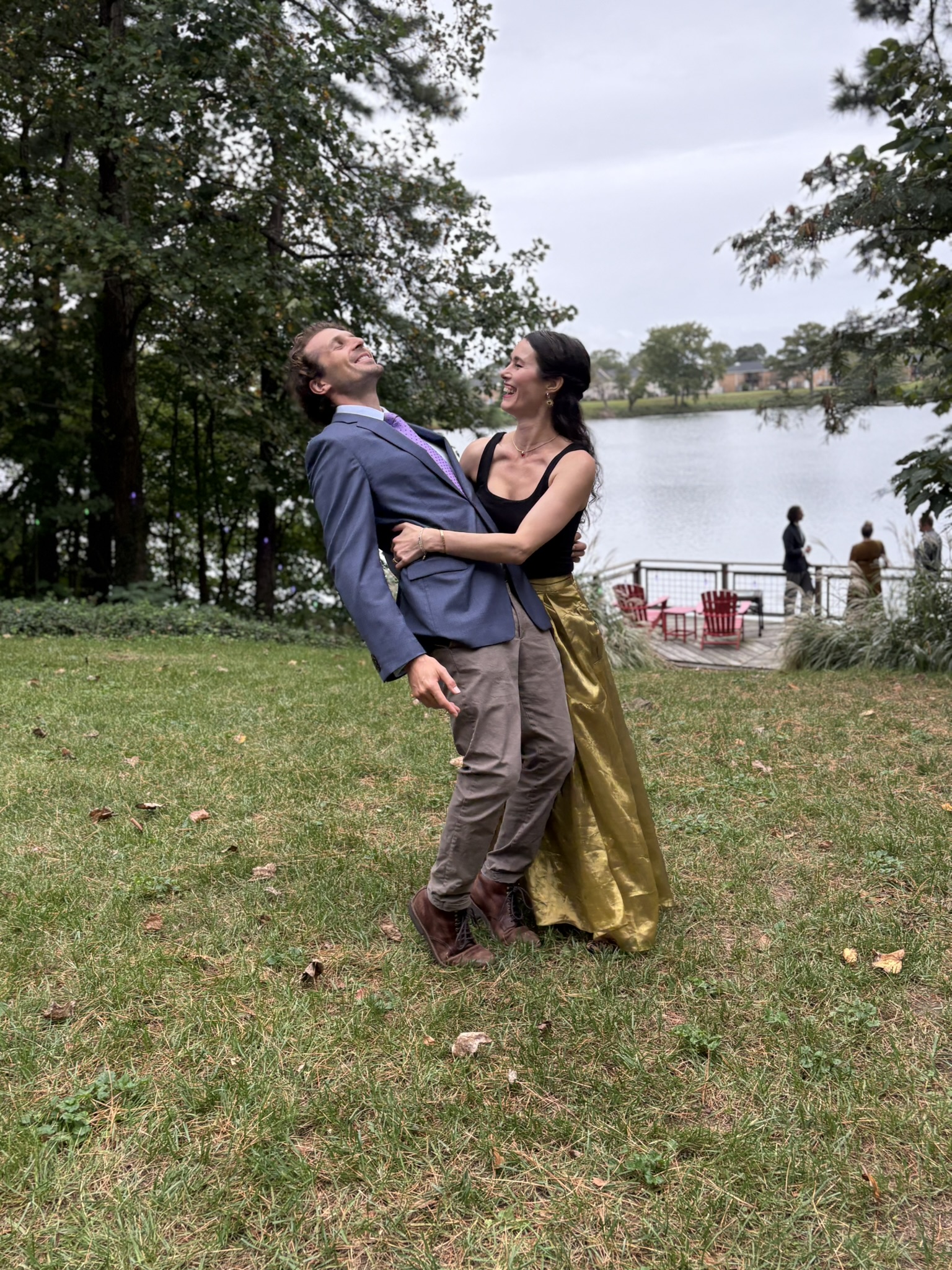 Gregory and Sherah laughing together outdoors